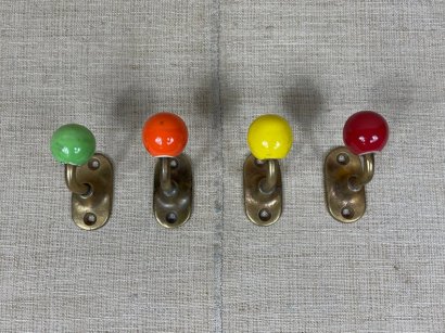 BRASS AND CERAMIC COAT HOOKS